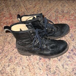 Frye black leather lace up combat boots. Size womens 7.